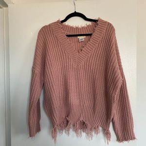 Pink distressed v-neck sweater